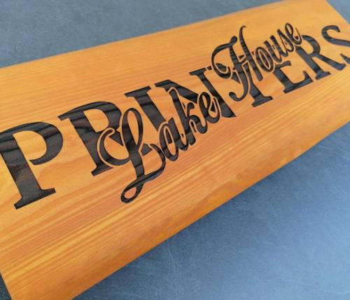 Enseigne en bois gravée au laser - Signalétique en bois