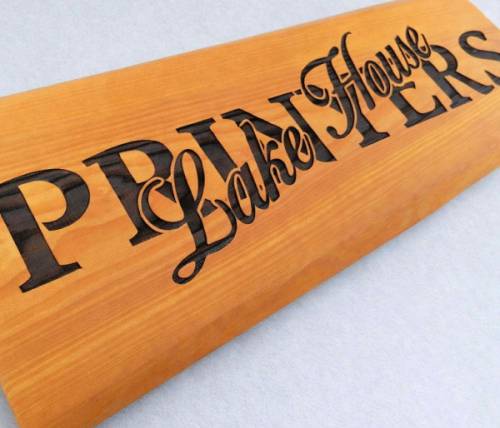 Enseigne en bois gravée au laser - Signalétique en bois